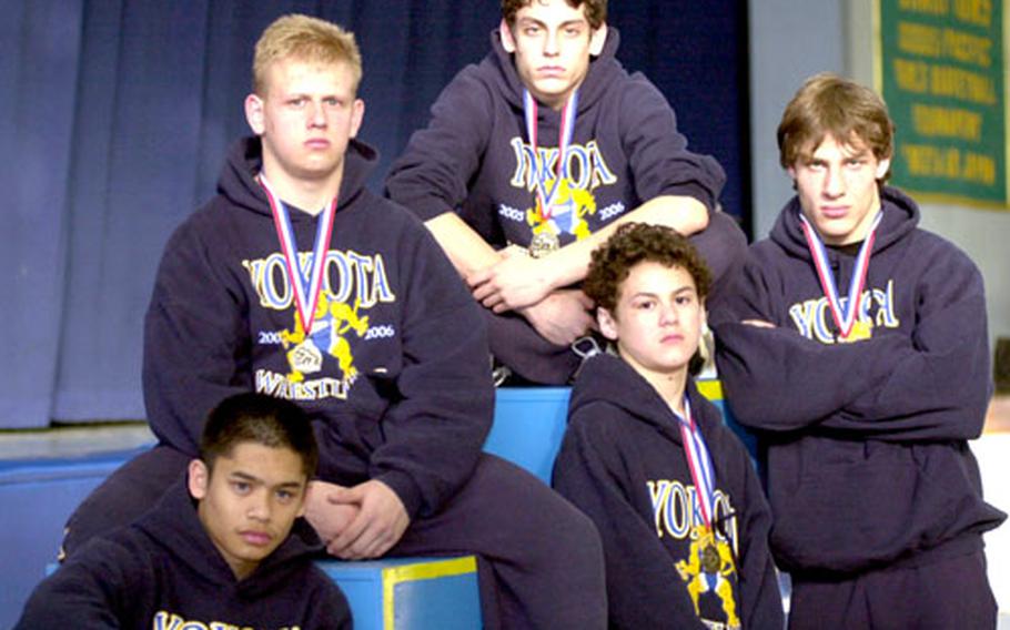 Clockwise from lower left, Patrick Pamintuan, Jim Scott, Jason Rodriguez, Zach Dopslaf and Mark Meade represent the present and future of a Yokota Panthers wrestling program.