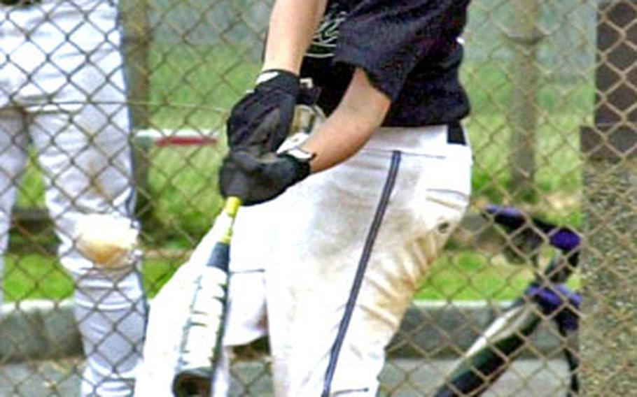 Kubasaki’s Dillon Mach raps a base hit during Saturday’s game.