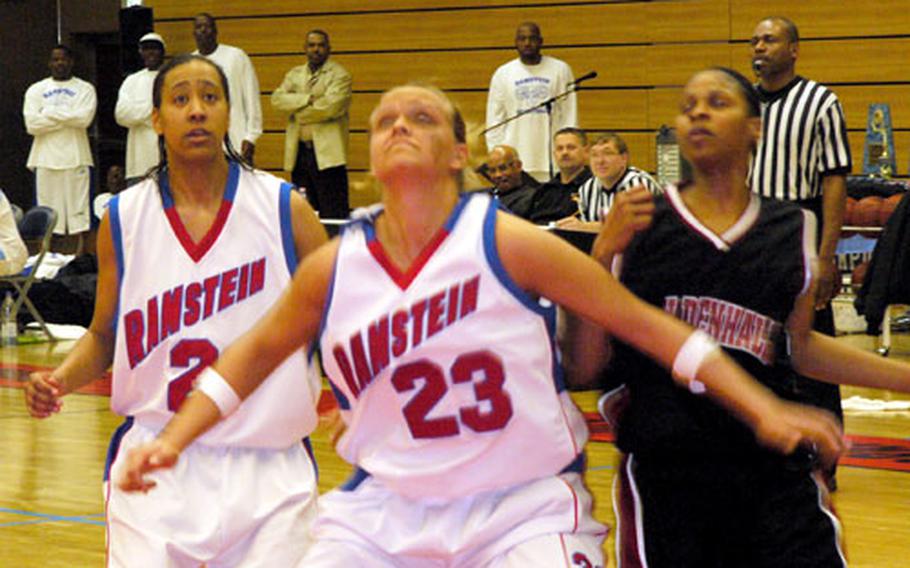 Ramstein’s Jennifer Brooks, center, establishes position Friday for one of her 23 rebounds during the Lady Rams’ 63-55 USAFE championship-game victory over defending champion Mildenhall on Friday at Spangdahlem, Germany. Flanking Brooks are Ramstein’s Ashonda Williams, left, and Mildenhall’s Ebony Morris.