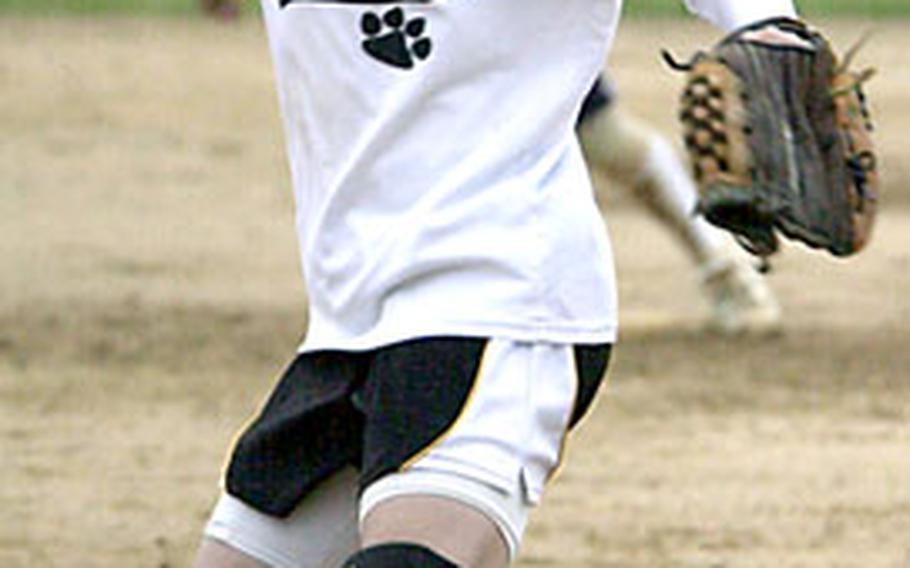 Kadena sophomore Kara Davis delivers against Urasoe High School on Friday at Chibana Recreation Area, near Kadena Air Base, Okinawa. Davis pitched three innings of relief, giving up one hit, one walk and an earned run while striking out five, but Kadena lost 9-1.