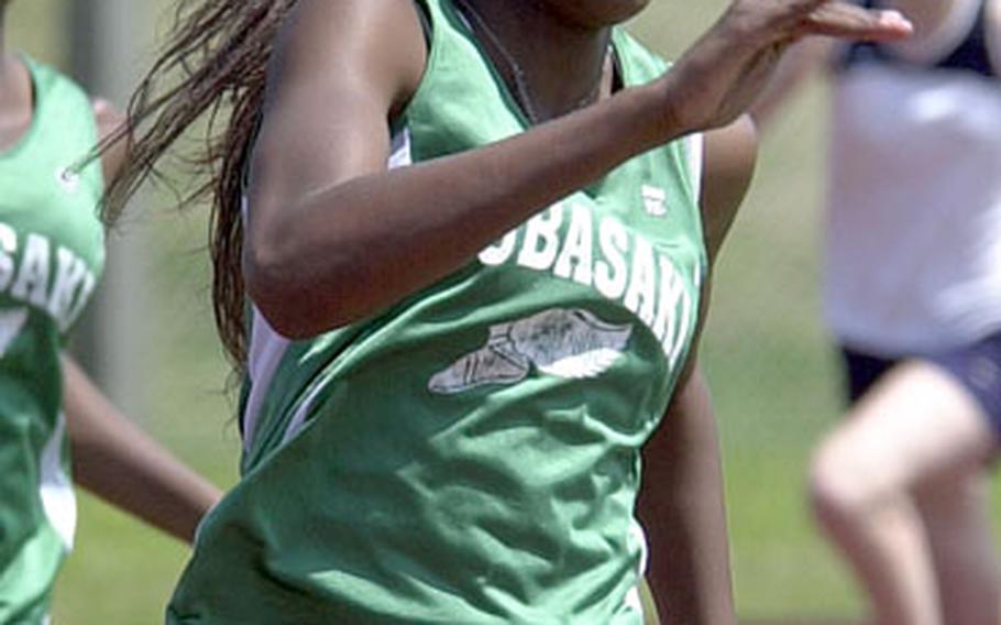 Kubasaki junior Kyera Tennyson races to the finish line during Saturday’s girls 400 relay in Petty Memorial track meet at Kubasaki High School, Camp Foster, Okinawa. Kubasaki won the race in 53.12 seconds, a meet record.