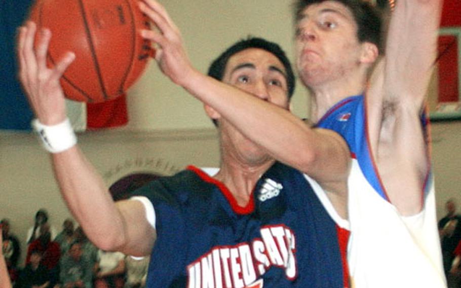 Josue Soto of the U.S. drives on Stefan Markovic of Serbia and Montenegro.