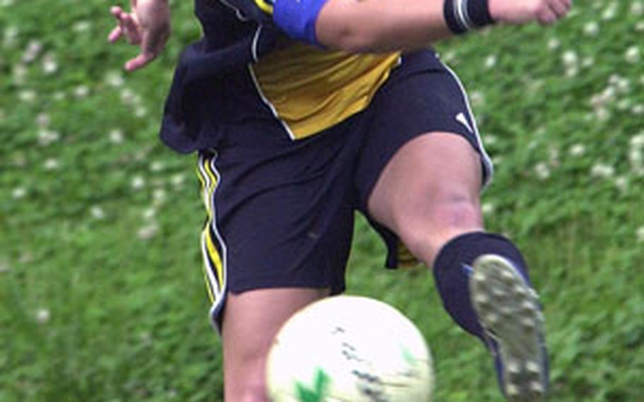 Kadena junior Jennifer Abel boots the ball against Okinawa Christian International during Saturday’s match at Yomitan, Okinawa. Abel scored four goals and assisted on two others.