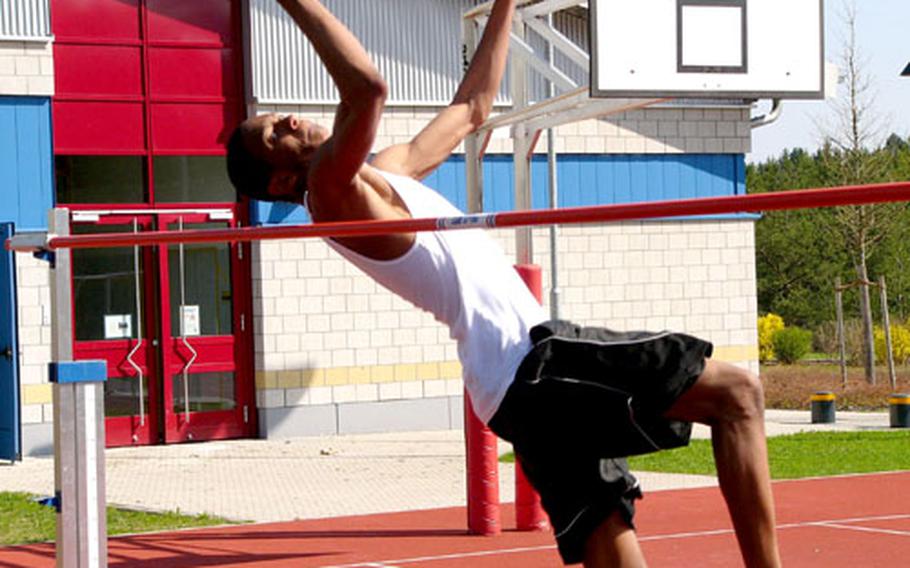 Jason Parks achieves lift-off Monday during high jump practice at Hohenfels High School. Parks cleared a DODDS-Europe season-best 6 feet, 4 inches at the same site on Saturday, and has his sights set on the high jump gold medal in the European track and field championships next month at Wiesbaden, Germany.
