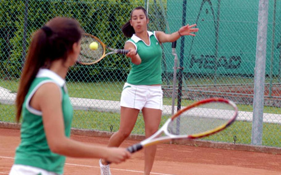 Kent Harris / S&S Naples’ Leila Rajazi watches teammate Jessica Ortega hit a return Saturday during the girls doubles finals of the DODDS-Europe Mediterranean tennis championships in Maniago, Italy.