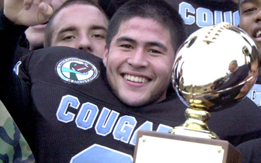 Osan American junior Carlos Albaladejo kicked a 34-yard field goal, made a fourth-down defensive stop and recovered a fumble to squelch an Edgren drive as the Cougars won the Class A football title.