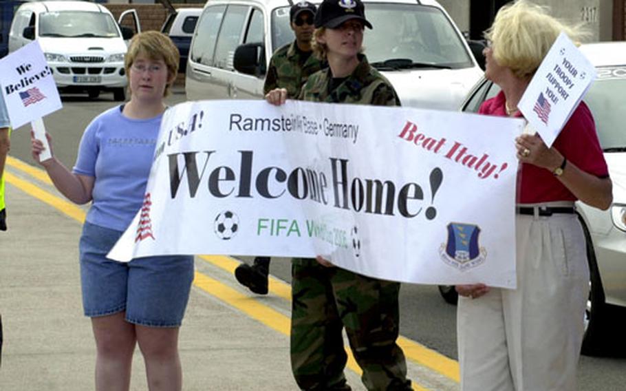 Fans greet the U.S. men&#39;s soccer team Thursday evening at Ramstein Air Base, Germany. The American team, which is staying on Ramstein, plays Italy Saturday at 9 p.m. in nearby Kaiserslautern.