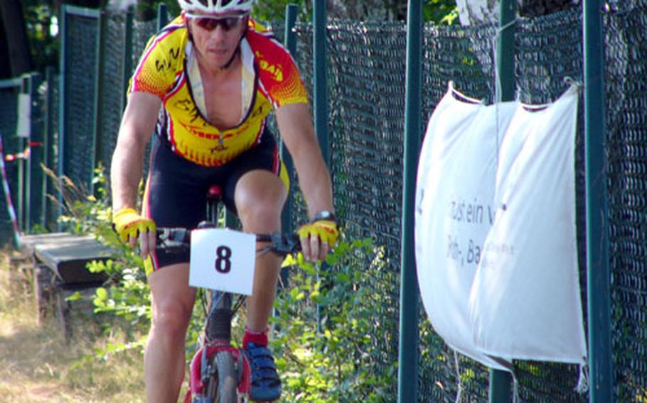 U.S. Forces Europe Mountain Bike Championship Series masters leader James Sharp of Hanau won in the longer, open division race Sunday in Ramstein.