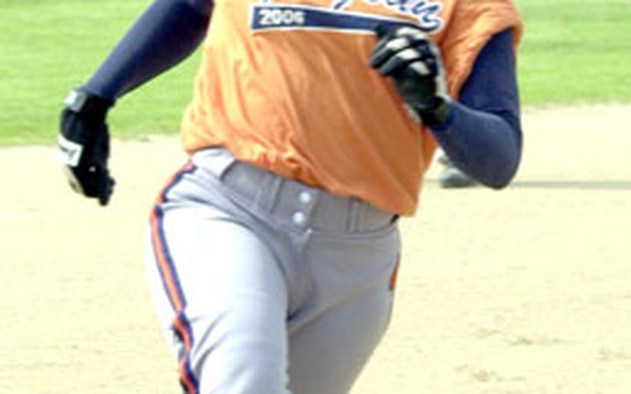 Shavon Bradford of Yongsan Garrison races toward third base against Camp Humphreys during Sunday’s women’s championship game.