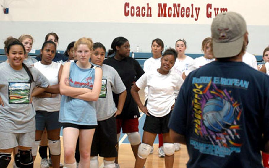 Aviano High School volleyball coach Hans Hillestad gives instructions to girls attending the preseason volleyball camp at Aviano earlier this week. More than 100 players attended.