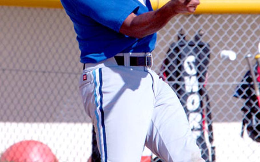 Keith Gilchrist of 1st Marine Aircraft Wing hits a two-run homer in the first inning of Wednesday’s 17-1 win over defending champion Base.