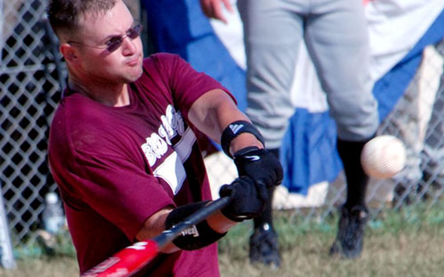 Matt Rosenberg of 3rd Marine Logistics Group takes his cuts against Iwakuni Air Station on Friday during the 2006 Marine Forces Pacific Regional Softball Tournament at Camp Foster, Okinawa.