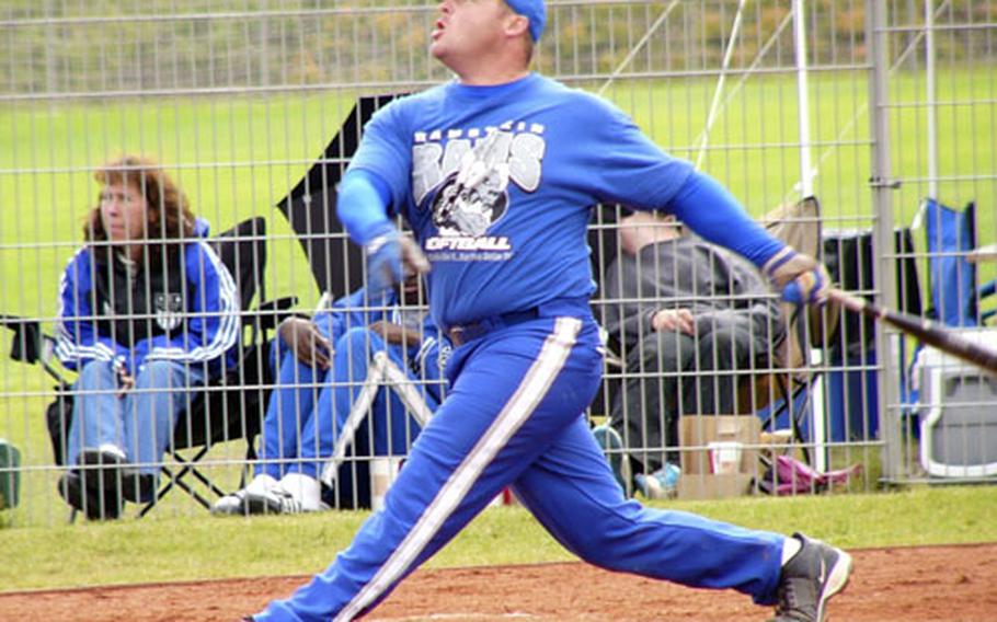 Ramstein’s Mark Noll watches one of the two home runs he hit Sunday leave the park. The Rams hit 13 homers and routed Spangdahlem 43-6 to win their second straight U.S. Forces Europe softball title.