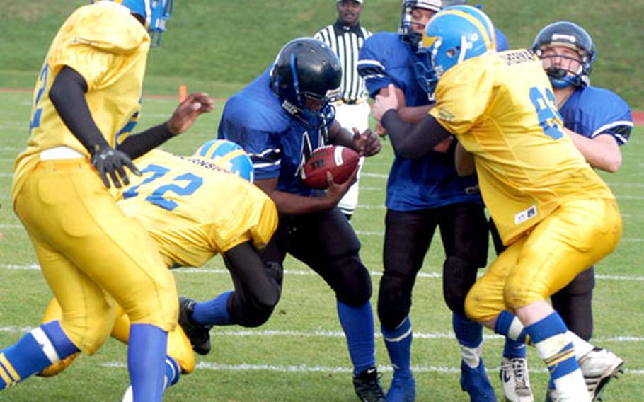 Hohenfels’ Brandon Merriweather carries the ball in last season’s Division III championship game against Ansbach. Merriweather is one of three returning All-Europe selections for the defending D-III champions.