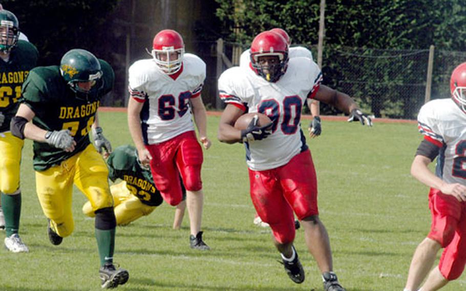 Menwith Hill running back LaShawn Adams breaks away for a long gain Saturday during the Mustangs’ 36-8 victory over Alconbury. Adams finished with 155 yards and two TDs.