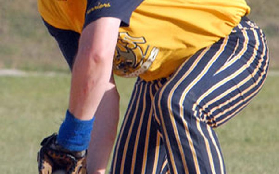 Shortstop Dan Davis of Japan’s Yokota Warriors fields a hard grounder against Okinawa’s Benchwarmers on Saturday.