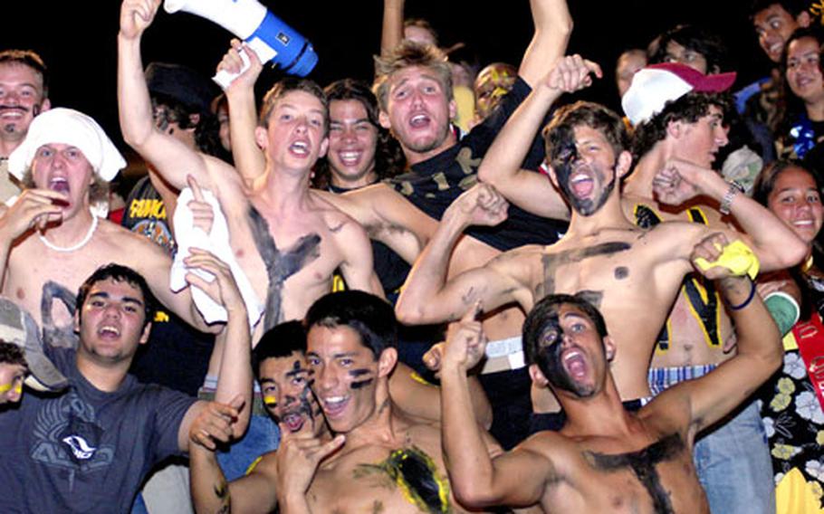 Kadena Panthers fans show their spirit during Friday’s game against rival Kubasaki at Kadena Air Base, Okinawa.