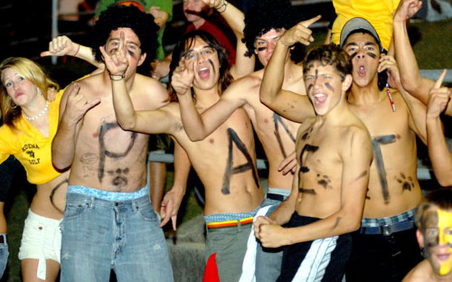 Kadena Panthers fans celebrate the team’s 14-8 victory over rival Kubasaki on Friday, Oct. 20.