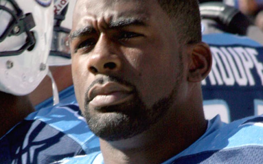 Tennessee Titans fullback Ahmard Hall watches the replay on the scoreboard during a challenge in a game at Washington Oct. 15.