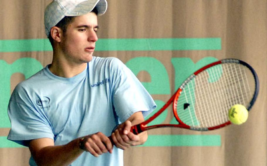 Europe boys defending champ and No, 2 seed Claudio Giraldi of SHAPE returns a shot from sixth-seeded Ryan Umstaedter, in their semifinal match on Friday. Giraldi will face top seed Nick Garcia of Heidelberg in the championship match on Saturday.