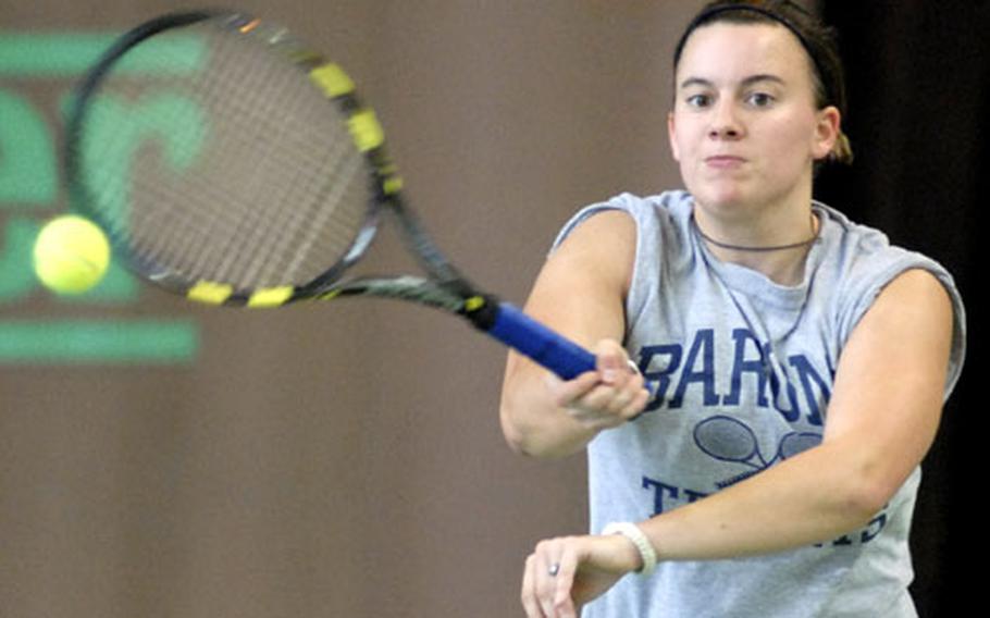 Bitburg’s Jennica Botonis slams a return to Milan’s Vittoria Musotto during a 6-7 (7-9), 6-0, 6-2 semifinal victory that put her in Saturday’s championship match against defending champ Krista Citkovska of SHAPE.