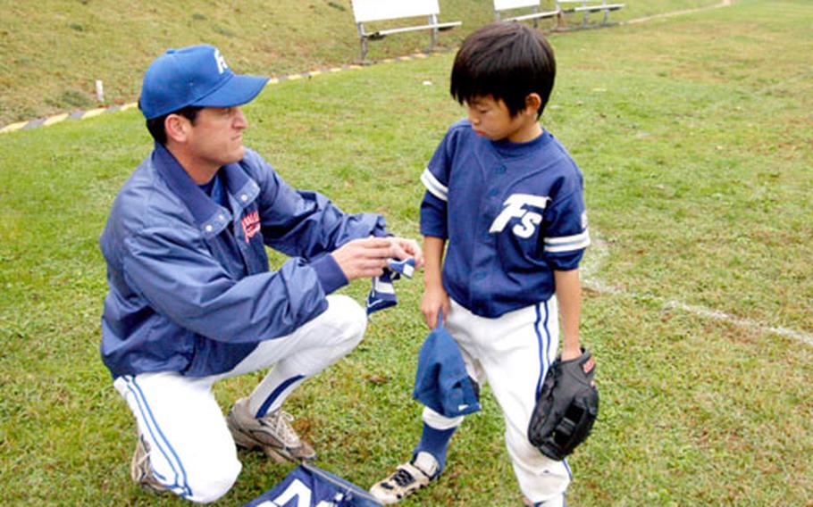 Off the field, he’s “Dad,” but on the field he’s “Coach,” says Kyle Fajardin, 12, of his father, Craig, who coaches his Japanese Little League team.