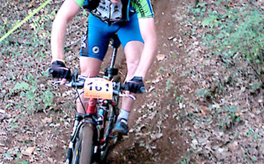 Paul Hosmanek negotiates a turn on the way to his final lap during the 19th Tour de Tama at the Tama Hills Recreation Area near Yokota Air Base, Japan. Hosmanek finished third overall in the race’s expert division.