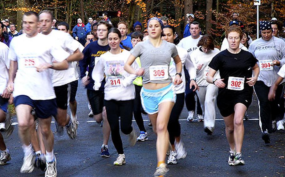 The three top women's finishers Antonia Giraud (302, first); Laurel McMahan (314, second) and Wendy Trimboli (305, third), all of Ramstein, start off together in the 5,000-meter field in Saturday's USAFE regional cross country championships at Ramstein Air Base, Germany. All three qualified for the six-woman team to represent USAFE at next month's Combined Command Air Headquarters Ramstein international cross country championships in Poznan, Poland.