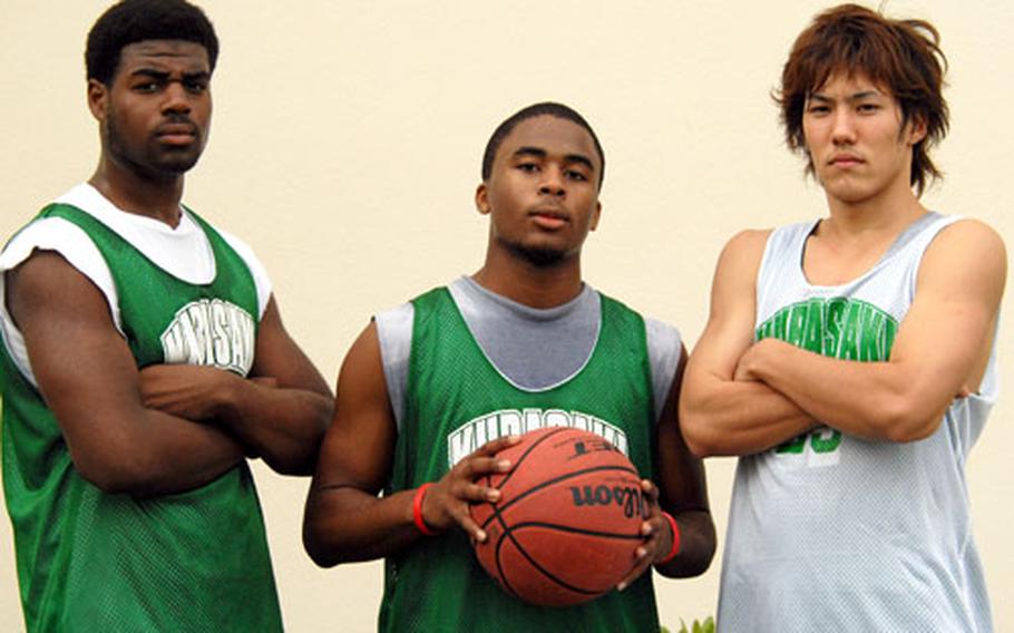 From left, juniors Tommy Fair and Quinton Mason and senior Tsutomu McCoy are trying to help Kubasaki overcome losing graduated seniors Steven Ellis, Steven Thompson and Vance Maxey.