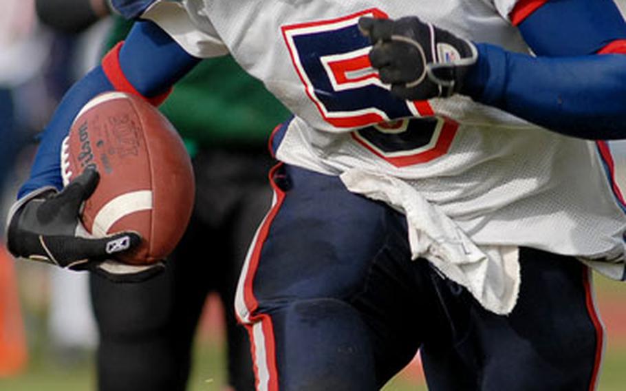 Bitburg’s Anton Harris rushes for a gain in the Division II championship game against Naples in November. Harris made the 2006 All-Europe team as a running back on offense and a linebacker on defense.