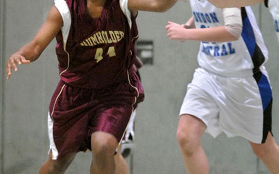 Baumholder&#39;s Lamesha Hall steals the ball from a London Central player during Saturday&#39;s game in Baumholder.