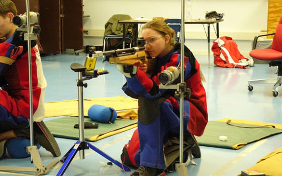 DODDS-Europe record-holder Brenna Goodman hones her shooting eye Tuesday at Würzburg High School. She has set a record in each of her last two matches, including the 293 out of 300 she fired Saturday.