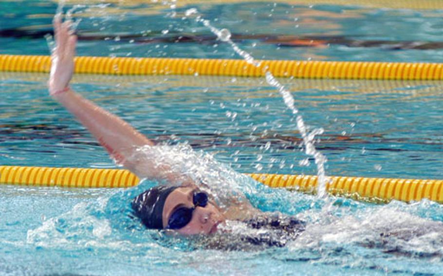 Kaiserslautern&#39;s Camille Kaczmar swims the backstroke during the 13 to 14-year-old girls&#39; 200 meter individual medley. Kaczmar won the event and the high points trophy in her age group, which means she scored more points than any other girl in her age group.