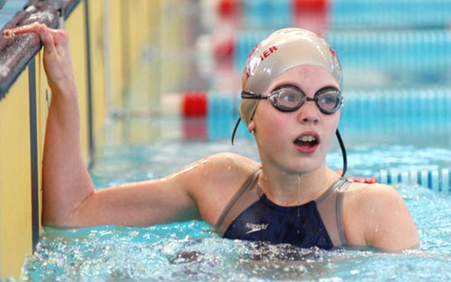 Kaiserslautern&#39;s Lily Thomas looks for her time after winning handily in the 12-year-old girls&#39; 50-meter freestyle.