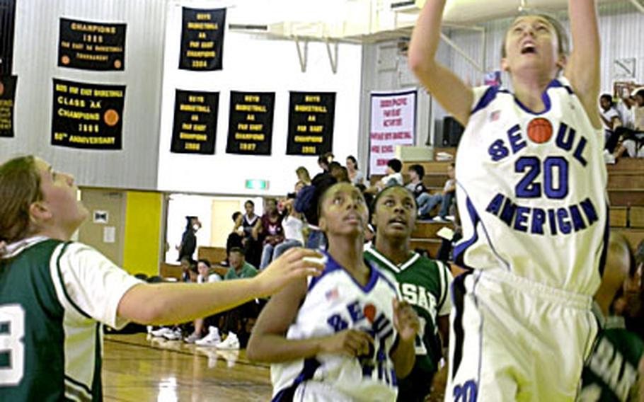 Seoul American&#39;s Jesse Bolander takes a shot in the final seconds of the third quarter Wednesday against Kubasaki.