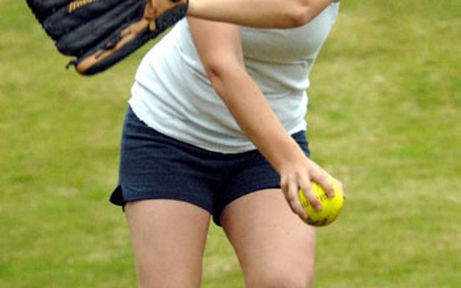 Kubasaki senior right-hander Chloe Freeman winds up and delivers during pitchers&#39; workouts behind Kubasaki High School on Camp Foster, Okinawa.