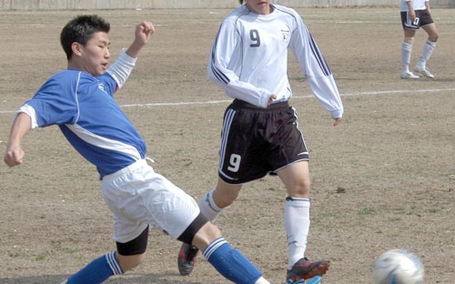 Seoul American&#39;s Jonathan Kim, left, rockets the ball past Taegu Christian International School&#39;s Sol Kim.