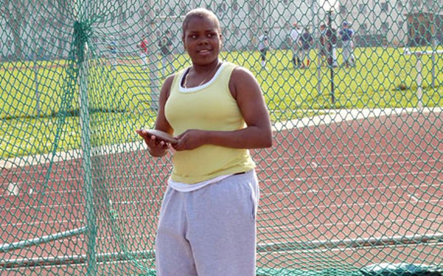 Heidelberg sophomore Jessica Blanks, the European shot-put champion, has her eyes on the discus gold medal this season. She is shown preparing to throw the discus during a practice session Tuesday at Heidelberg.