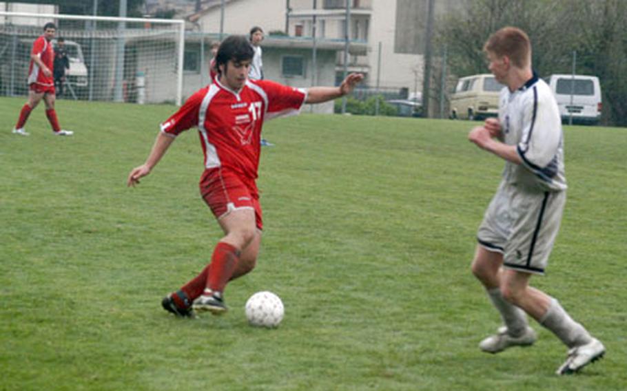 Aviano&#39;s Josh Cafferty defends against Ludovico Linari from the American Overseas School of Rome as he dribbles the ball during AOSR&#39;s 3-0 win Saturday in Aviano.