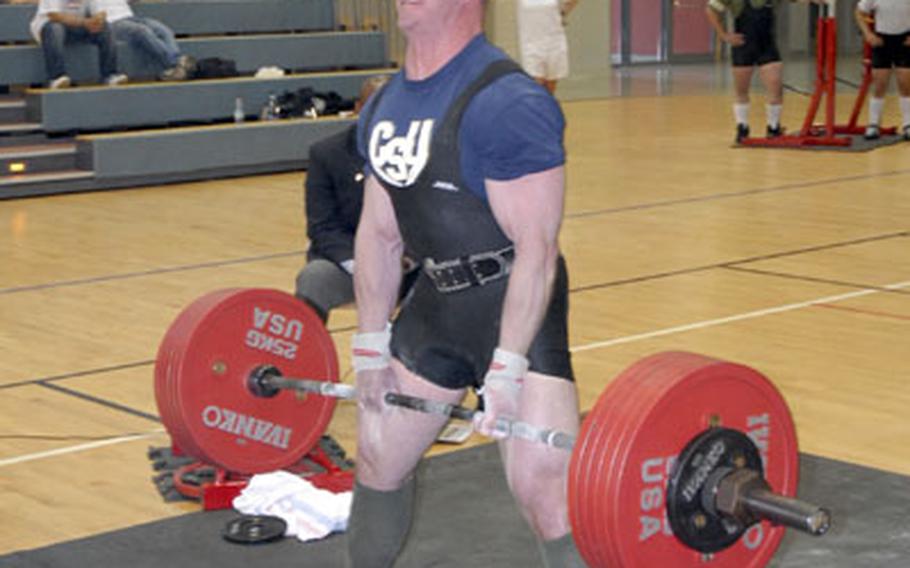 Jason Watson, a soldier from Vilseck, Germany, dead lifts more than 600 pounds during the U.S. Forces Europe Powerlifting Championships at Warner Barracks in Bamberg, Germany, on Saturday. Watson, the lone competitor in his weight class, lifted a total of 1,664.74 pounds
