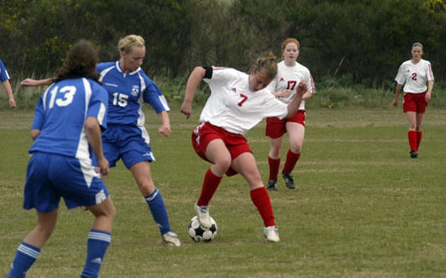 Lady Lancer Greta Gerstner shows some deft footwork as she controls the ball against the Wiesbaden defense. Gerstner scored twice in Lakenheath&#39;s 3-0 victory over the Wiesbaden Lady Warriors on Saturday.