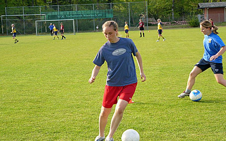 Fallon Puppolo, an All-Europe defender last season with the Heidelberg Lady Lions, works on her ball control while practicing.