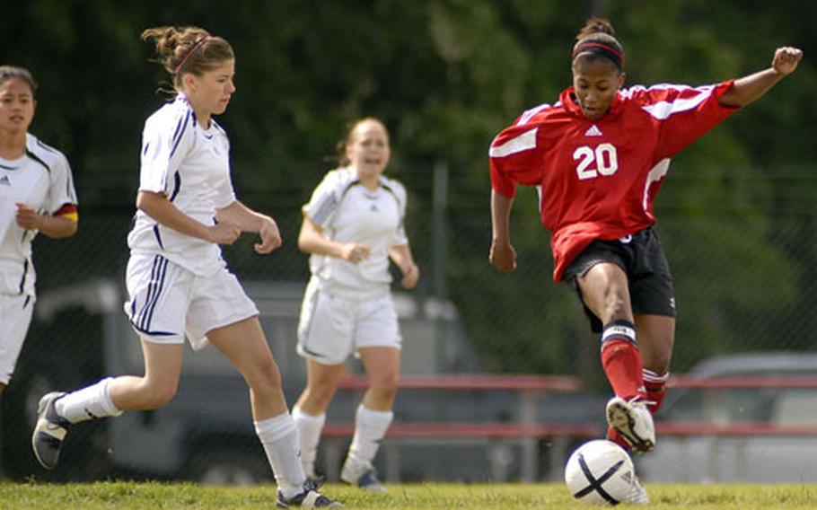 Kaiserslautern&#39;s Liana Knight controls the ball as Ramstein&#39;s Megan Arceneaux closes in during the second half Saturday at Ramstein. Knight scored two of Kaiserslautern’s three goals in a 3-3 tie.