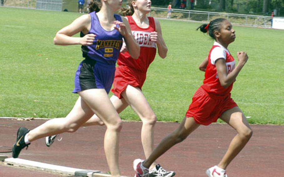 Marche Bobbs, a 14-year-old Kaiserslautern freshman, holds off teammate Colleen Smith and Mannheim&#39;s Susan Grunt to win the girls 800-meter race on Friday with a time of 2 minutes, 25.87 seconds.
