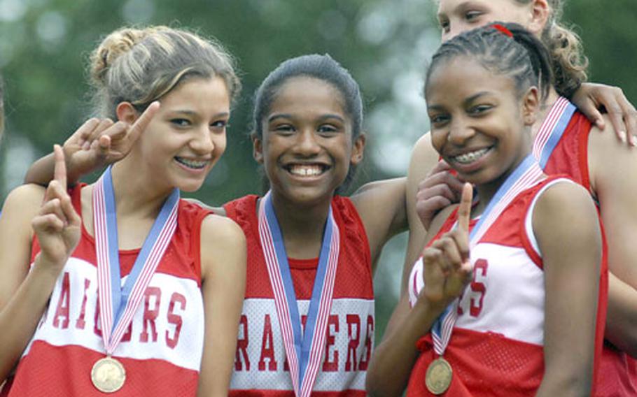 Kaiserslautern&#39;s record-setting 4x800-meter relay team won in 9 minutes, 58.84 seconds. From left: Tracey Ely, Symone January, Marche Bobbs and Coleen Smith.