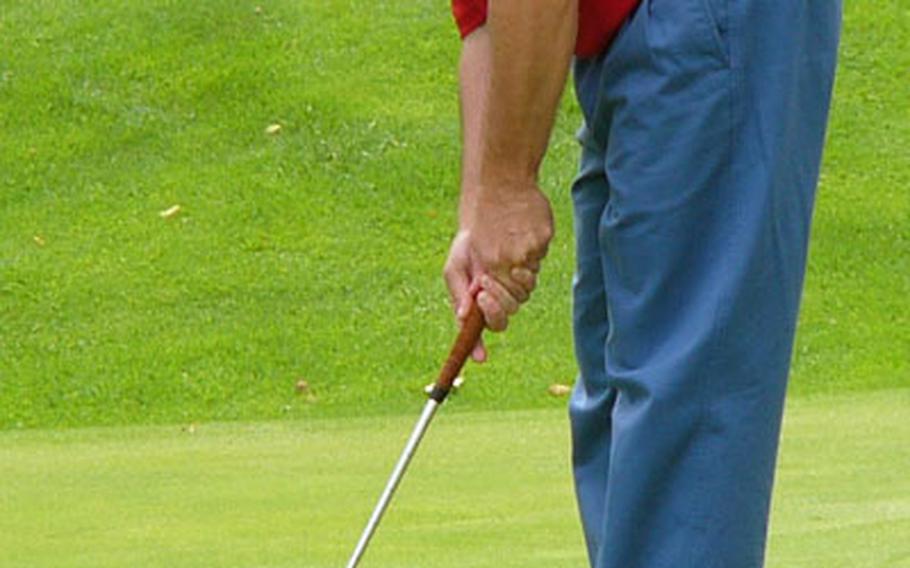 Jeff Hallauer putts his way toward a two-over 74 and his fourth straight U.S. Forces-Europe golf championship on Sunday.