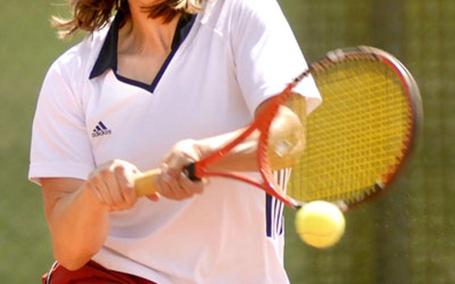 Maya Pardee from Spangdahlem volleys the ball during the final set of her U.S. Forces Europe Tennis Championship game against Alessandra Pickerill of Heidelberg Sunday at Heidelberg. Pardee clinched the women’s open title, beating Pickerill 6-1, 7-5.