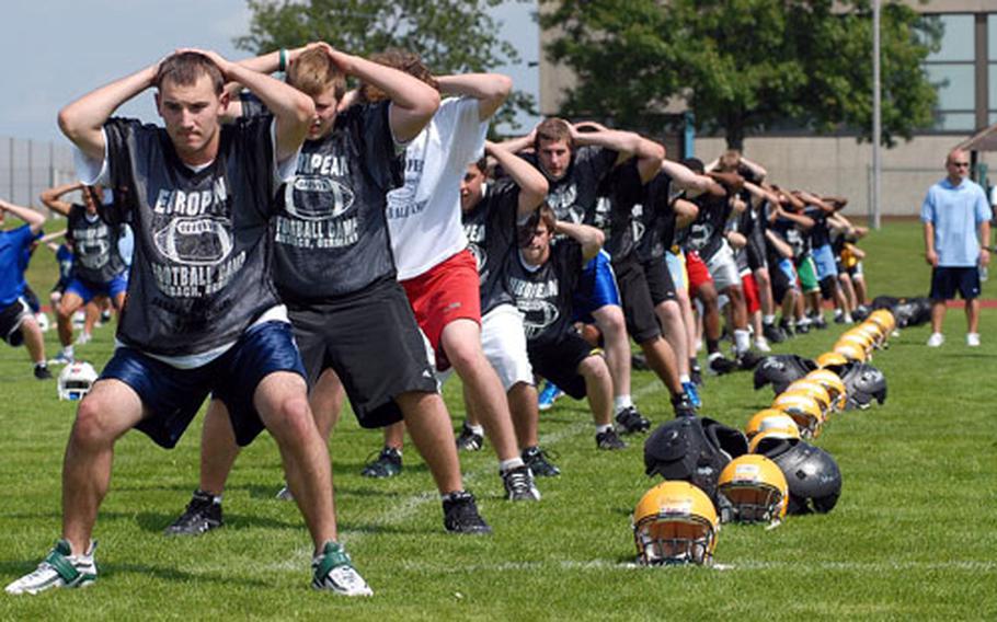 The participants at the DODDS-Europe football camp work out at the beginning of the afternoon session. About 490 athletes from 21 DODDS-Europe high schools took part in this year's camp held at Ansbach High School in Katterbach, Germany, that ends.