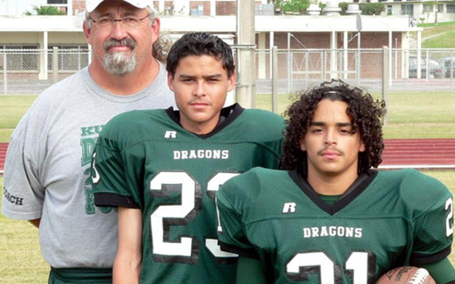 Kubasaki Dragons coach Fred Bales and sons Caleb, middle, and Josh as Dragons players in 2006, when Caleb was a senior and Josh a freshman. Josh is in line to be one of a "running back by committee" for the Dragons.
