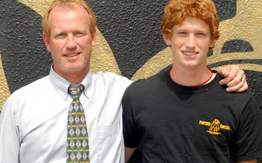Kadena Panthers offensive coordinator Steve Schrock and his son, Stanley, a sophomore quarterback-safety-wide receiver.
